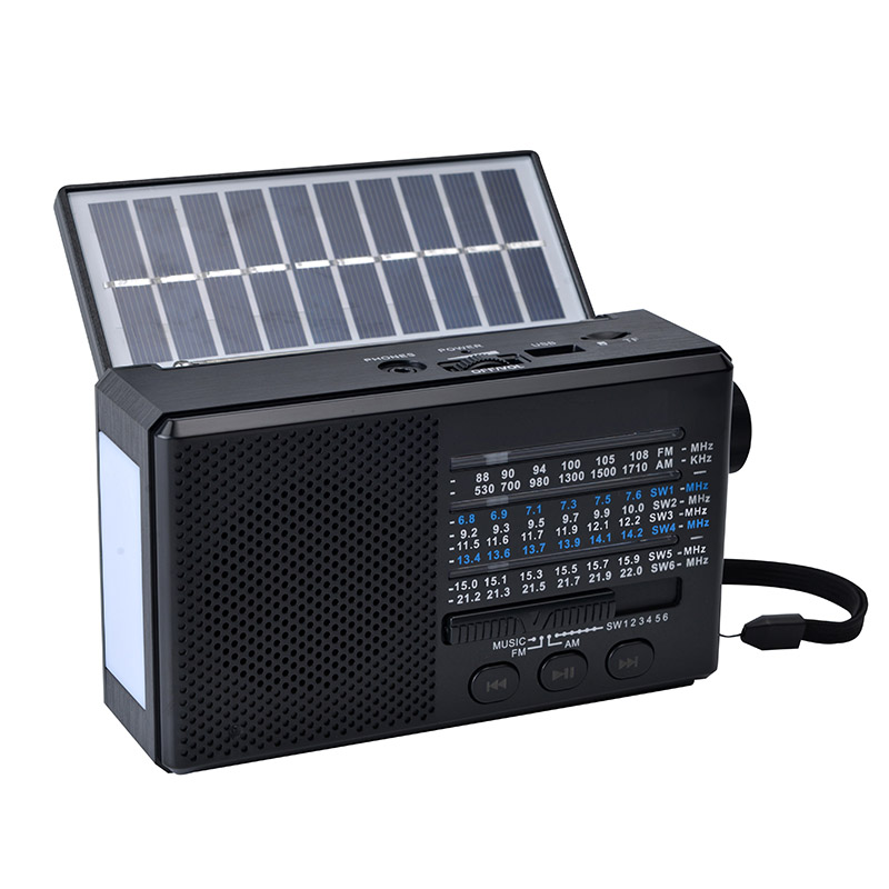 Solar panel speaker with torch